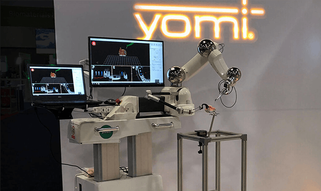 The first surgical robot designed for dental implant surgery, Yomi, surpasses 1,000 implants