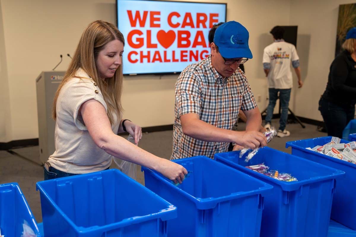 Henry Schein Team Builds 23,000 Hygiene Kits for Children Facing Medical Challenges. Image credit: © Henry Schein Inc